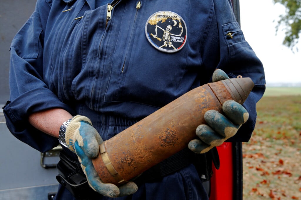A Deminer From A Bomb Disposal Unit Holds An Unexploded Shell Recovered In A Field In Jametz, Close To Wwi Battlefields, Near Verdun, France, October 24, 2018. Before The Centenial Commemoration Of The First World War Armistice Day
