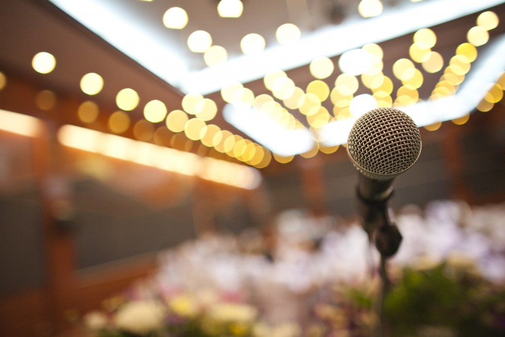 Close Up Of Microphone In Concert Hall Or Conference Room