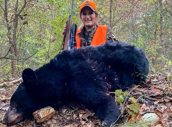 Kelsie Wikoff of Hume harvested this 268-pound boar (male bear) in Zone 1 during Missouri’s first bear-hunting season. (Photo credit: Kelsie Wikoff/MDC)