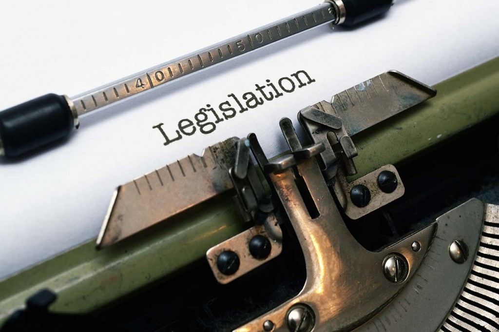 Typewriter typing the word Legislation