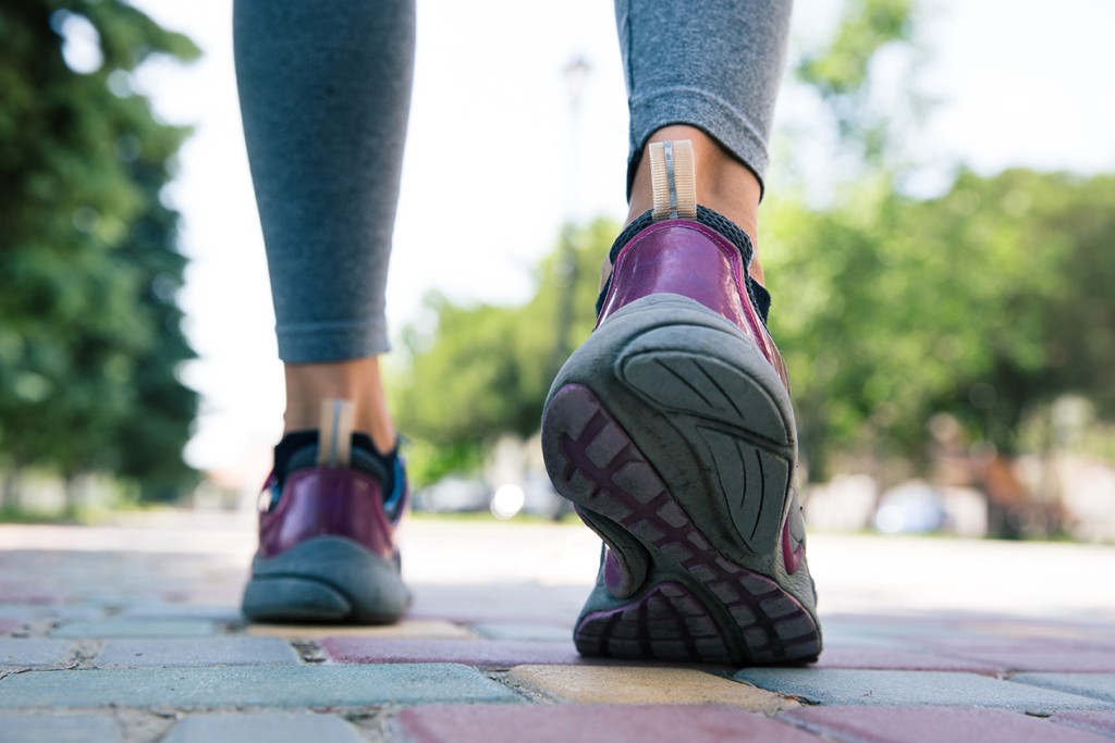 Footwear On Female Feet Running On Road (Source: Storyblocks)