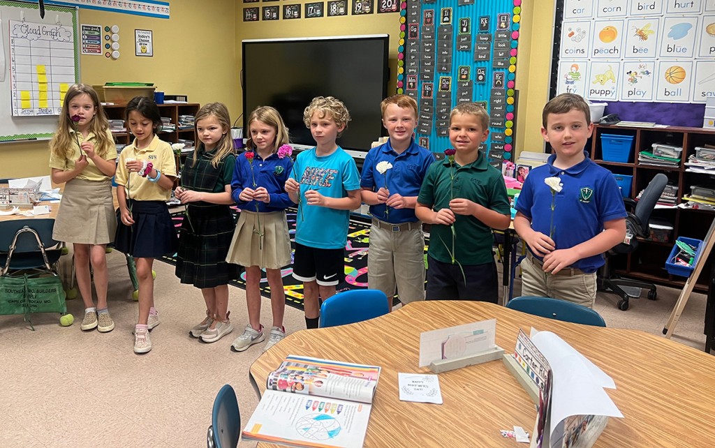 Students at St. Vincent de Paul School in Cape Girardeau gave their teachers a flower to show appreciation.