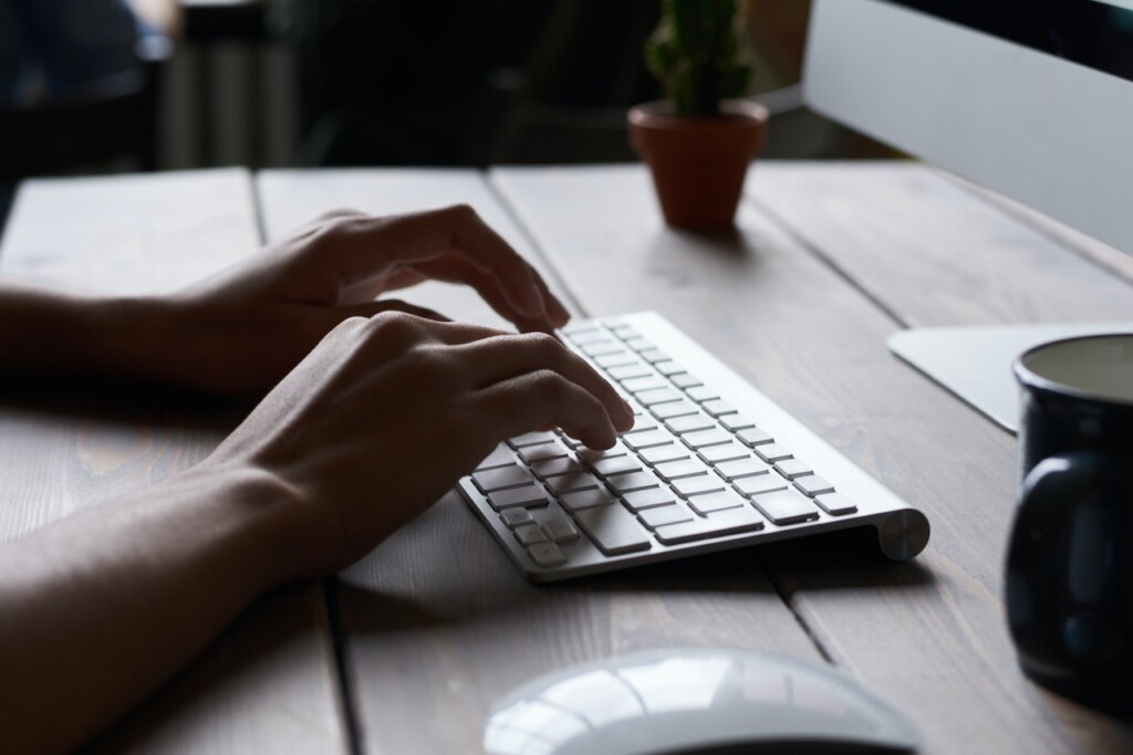 hand typing at keyboard (Source: Pexels/Fauxels)