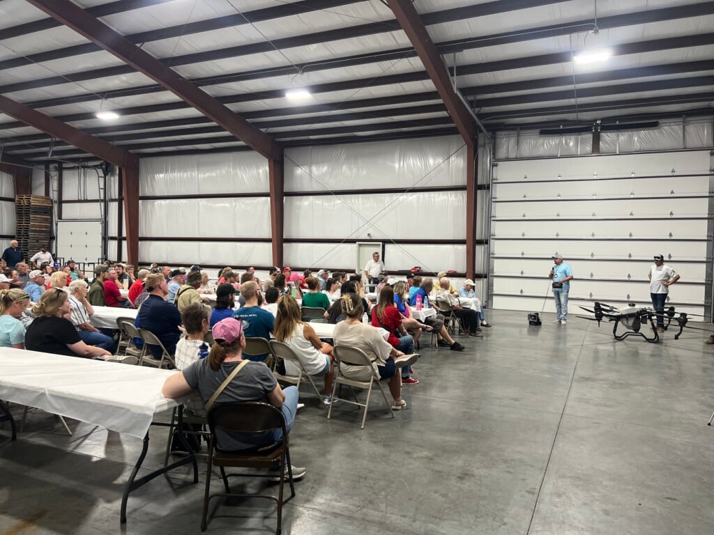 Participants in the 43rd Annual Agri-Business Tour learn about drones. (Source: Sasha Moore)
