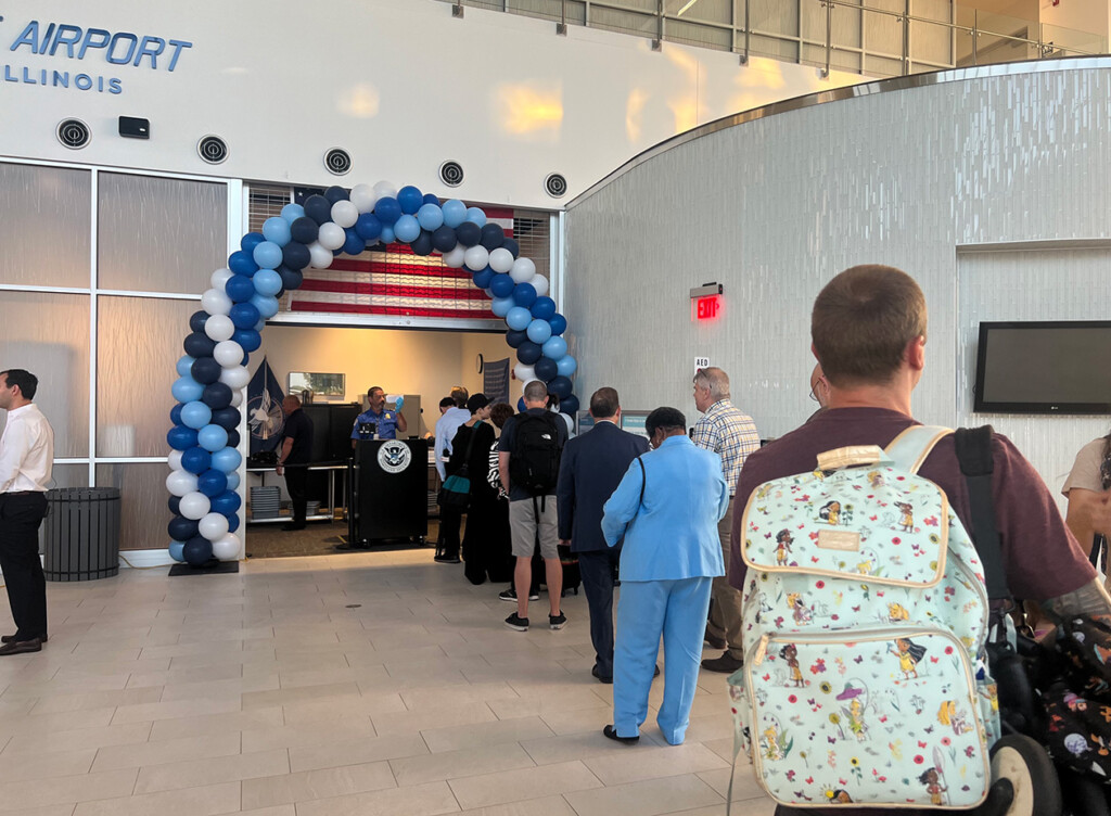 People wait in line to board the first flight with Contour Airlines from Marion, Ill. (Source: Sasha Moore/FOX23 News)