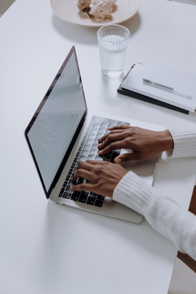 hands on laptop (Source: Pexels/Cottonbro Studio)