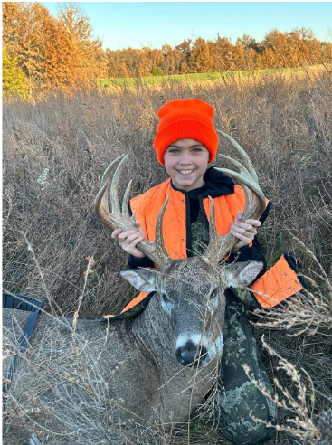 Annie Ramsey, 11, of Salisbury, harvested this buck while hunting on private land in Chariton County on Sunday of opening weekend. She was among the hunters in Missouri who harvested 90,334 deer during opening weekend of the November portion of firearms deer season Nov. 11 and 12. (Source: Mark Ramsey/MDC)