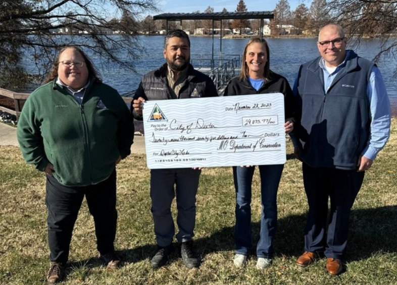 MDC provided the City of Dexter with $29,075.77 for restroom facilities and a concrete walkway through a Land Conservation Partnership grant implemented as part of an ongoing Community Assistance Program (CAP) agreement. Seen here (from left) are MDC’s Laura Ruman and Salvador Mondragon, and City of Dexter’s Jamie Rowe and David Wyman. (Source: Missouri Department of Conservation)