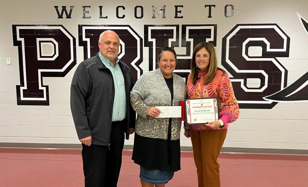 Crystal Huddleston (center) of PBHS is presented the 2023 Outstanding Educator award on Friday, Dec. 8, by Tony Seabaugh, McDonald’s area supervisor, and Director of Operations Cheryl Farrow. (Source: Poplar Bluff R-I School District)