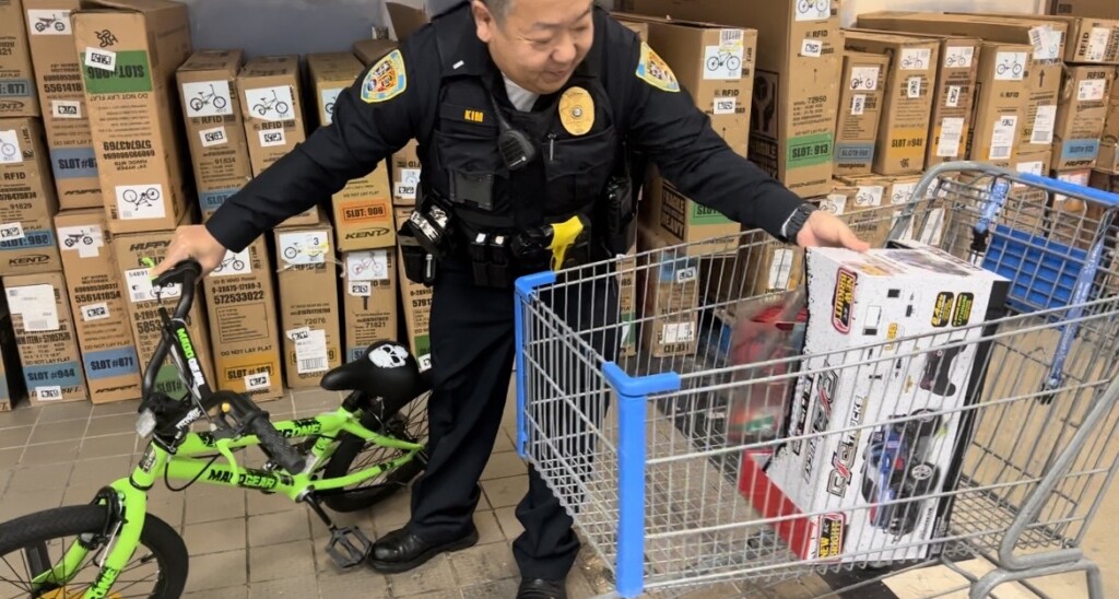 A Sikeston DPS officer picks out a pick and toy car for a child. (Source: FOX23 News Multimedia Journalist Sasha Moore)