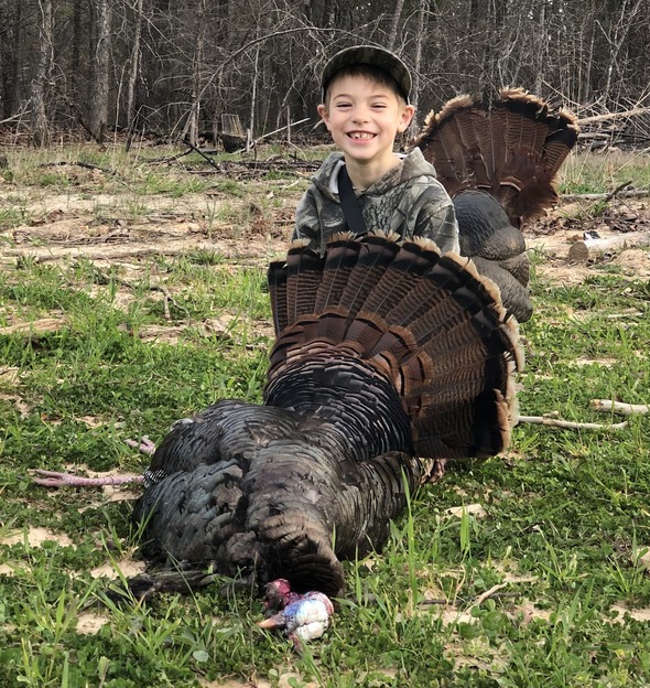 Grady Stahl, 6, was among the young hunters who harvested 3,721 turkeys during youth weekend this past weekend. It was his first harvest. (Source: MDC)