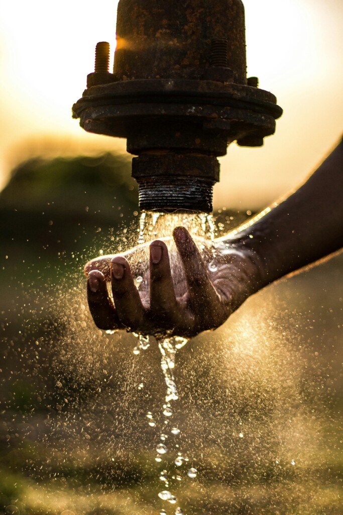 water pipe hand (Source: Pexels/Nitin Sharma)