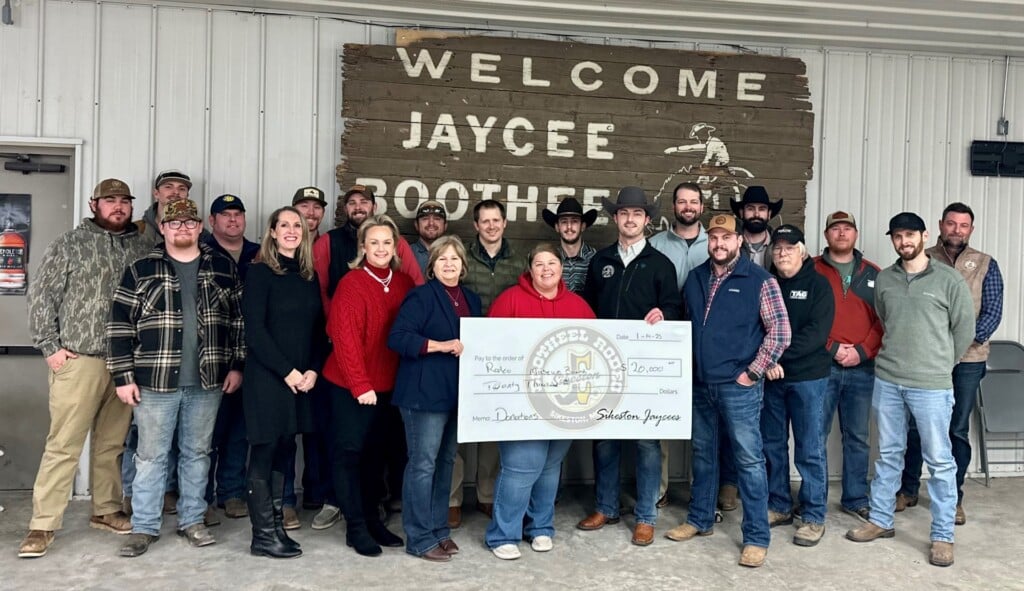 Sikeston Jaycees President Spence Vaughn Presenting Check To Sikeston Rodeo Museum Board Members
