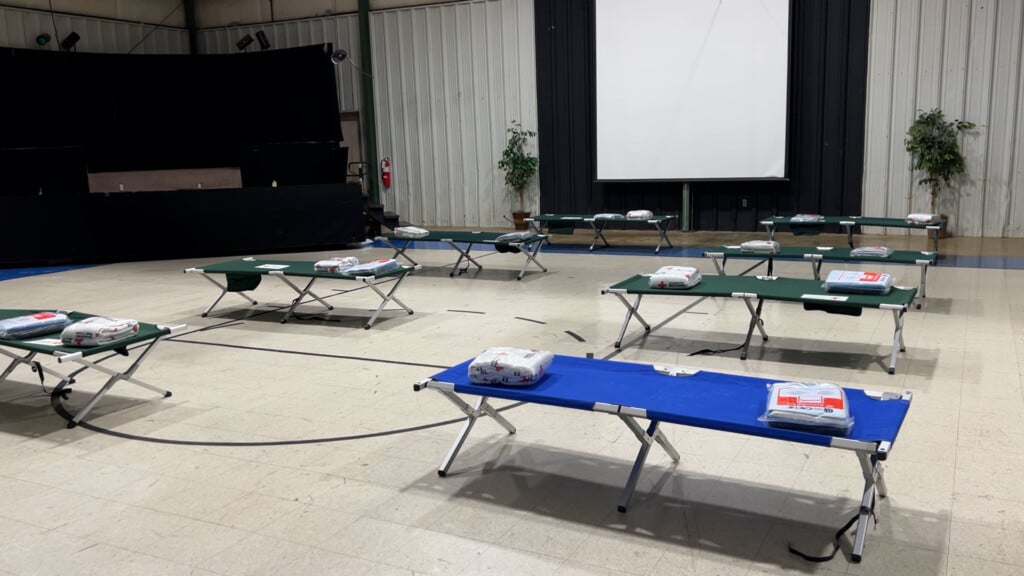Cots in a Red Cross Shelter