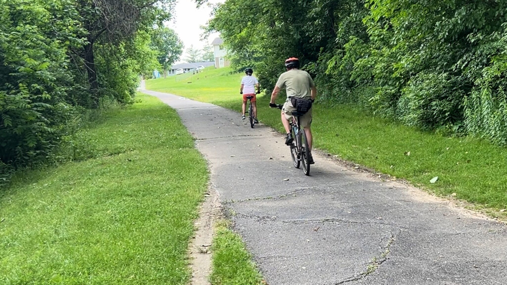 Two bicyclists riding on the Cape LaCroix Bike Trail