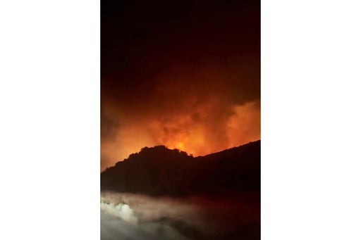 Firefighters Make Progress Against Fast Moving Blaze Along Highway North Of Los Angeles