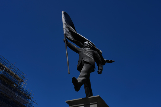 Banksy Confirms A New Statue In Central London Of A Man Blinded By A Flag Is His Work