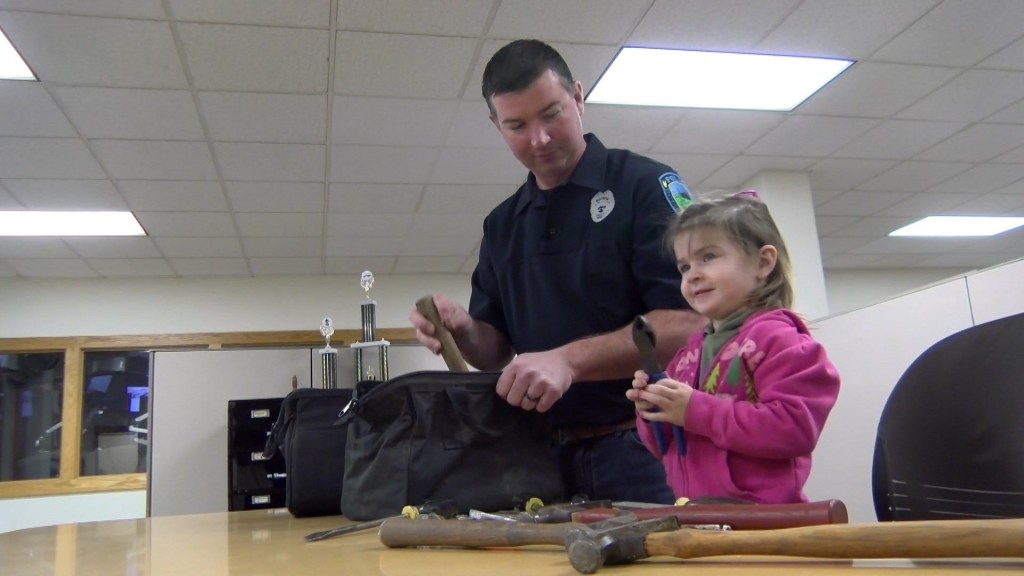 Beatrice Police officer collecting supplies for farmers affected