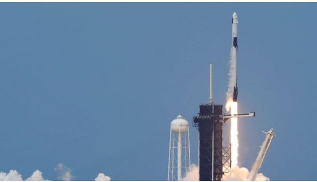 NASA astronauts blast off into space on a SpaceX rocket