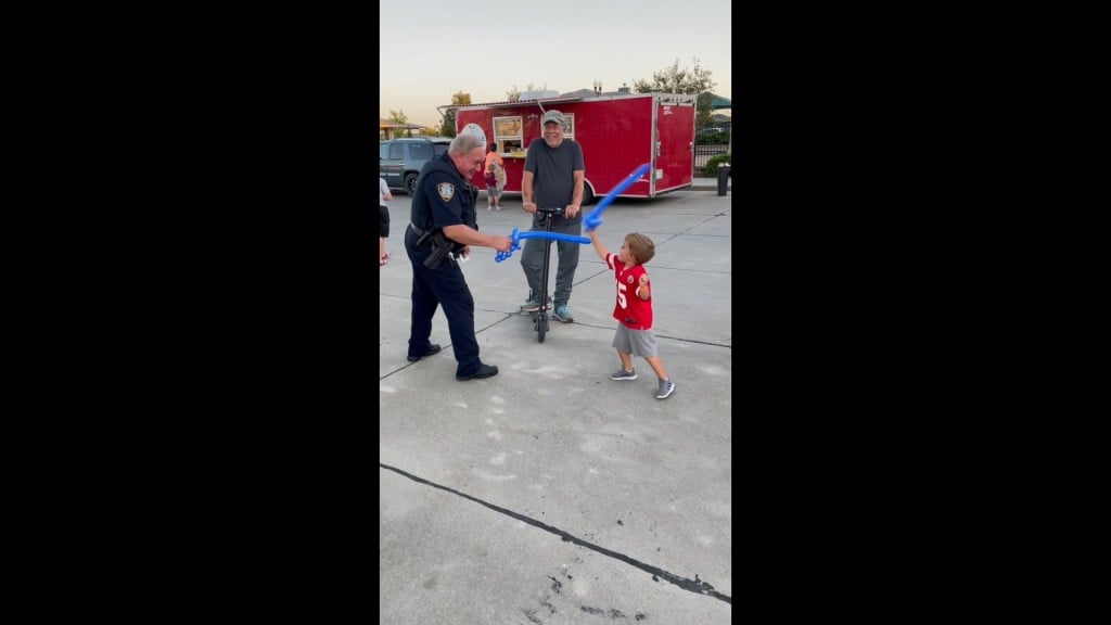 Young boy battles officer