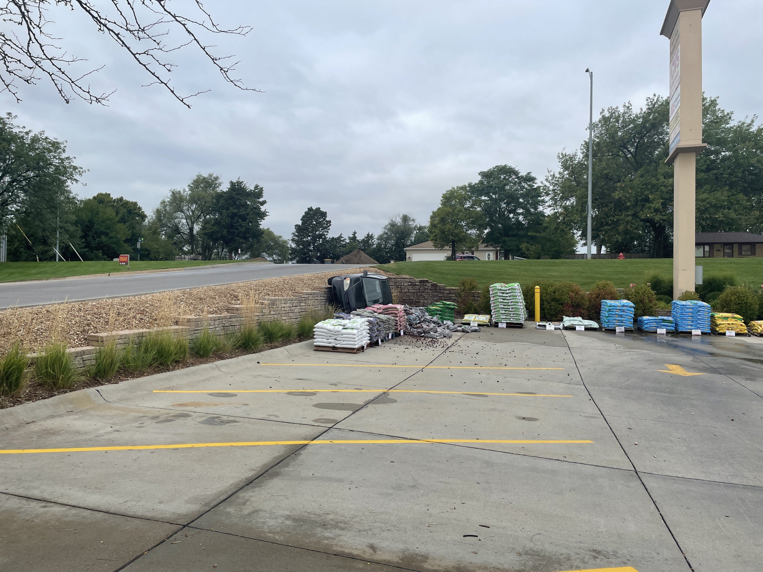 Car flipped over near 14th and Superior