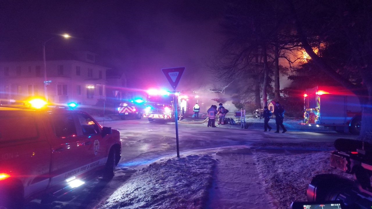 Crews battle an early morning house fire in Lincoln