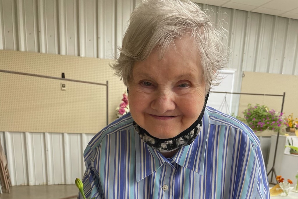 JoAnne Bates with flowers