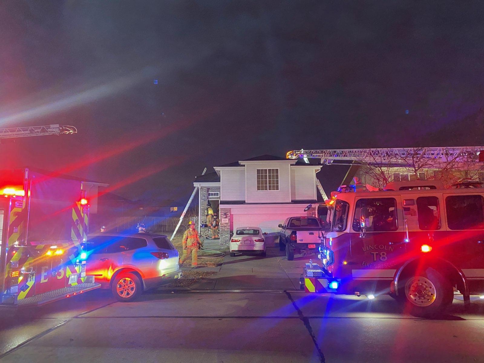 More than a dozen units called to fight a house fire in Lincoln Monday