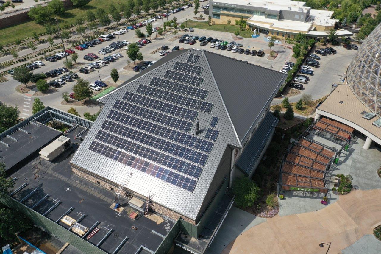 Omaha zoo installs 168 solar panels on roof of theater