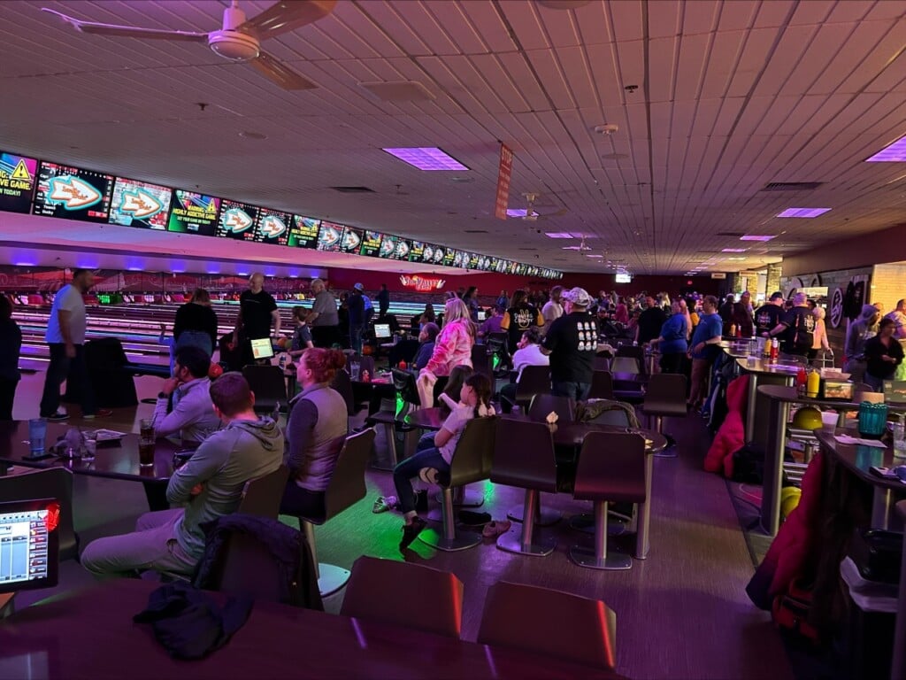 hundreds gathered at a bowling alley to raise awareness for pediatric cancer