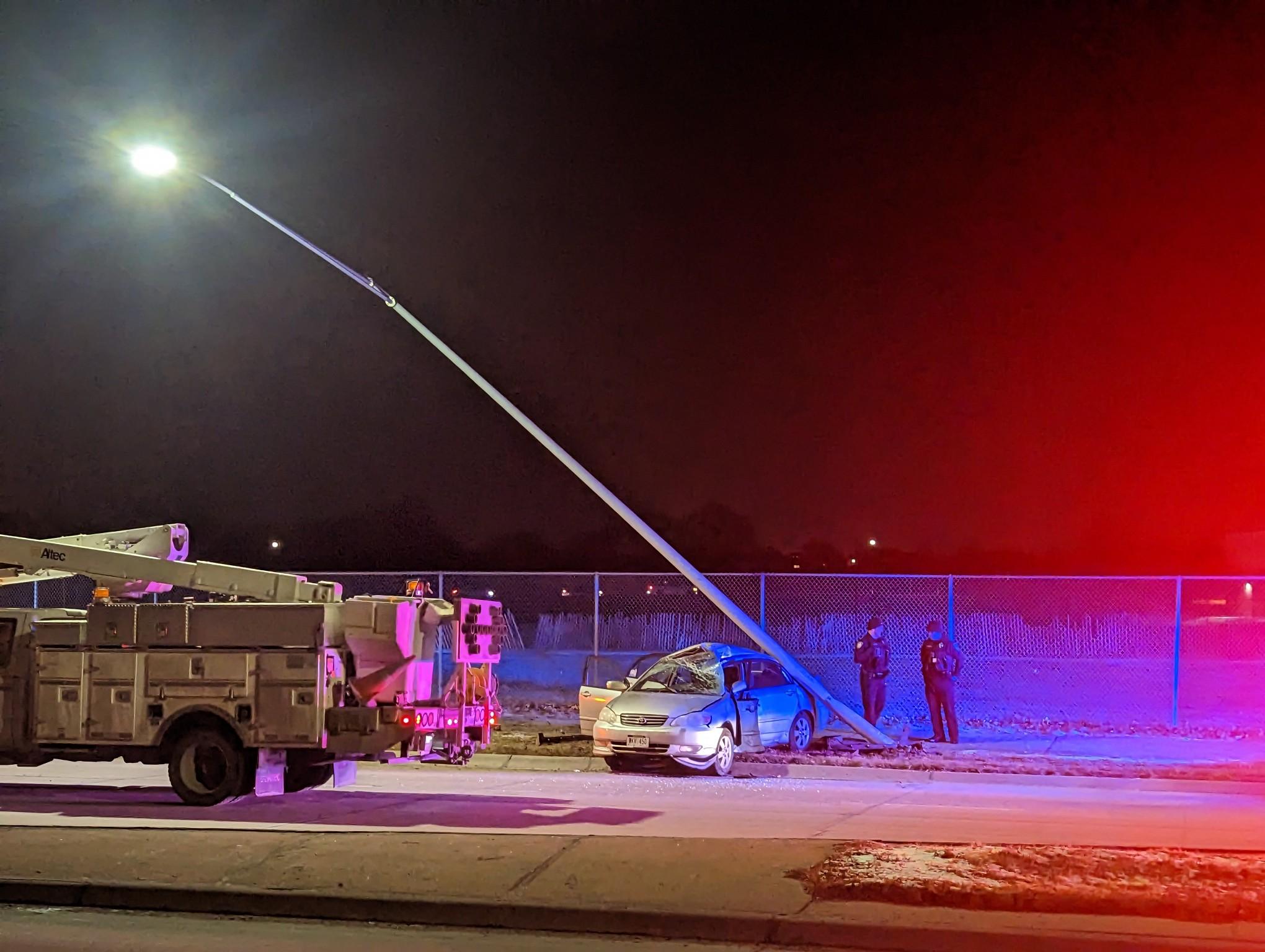 Car crashes into light pole in Lincoln, sending two to hospital
