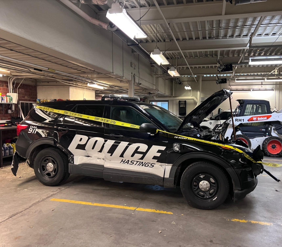 Skid loader causes damage to several police cruisers