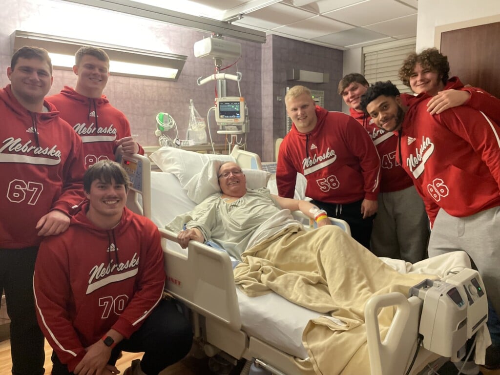 Nebraska football players visit hospital patients