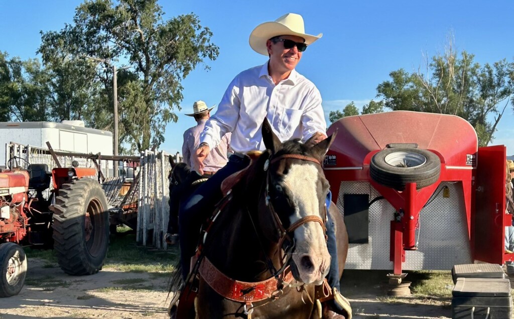 Gov. Jim Pillen rides a horse at Nebraska's Big Rodeo in 2023.