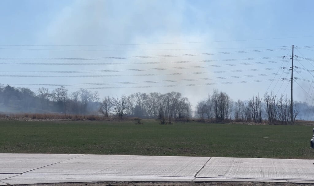 Several fire departments battle grass fire at state penitentiary in south Lincoln