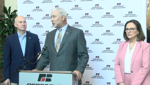 From left. Sen. Pete Ricketts, Nebraska Farm Bureau President Mark McHargue and Sen. Deb Fischer.