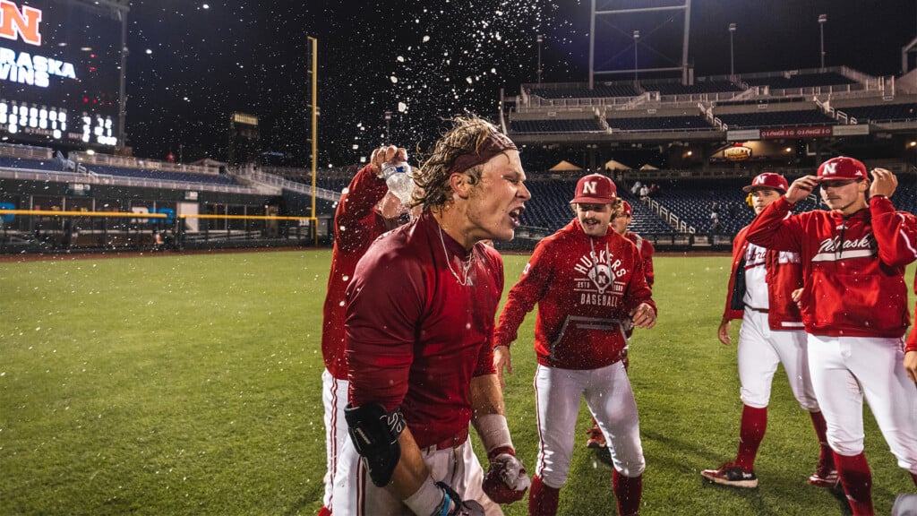 The Nebraska baseball team celebrates its win over Michigan State in the Big Ten tournament.