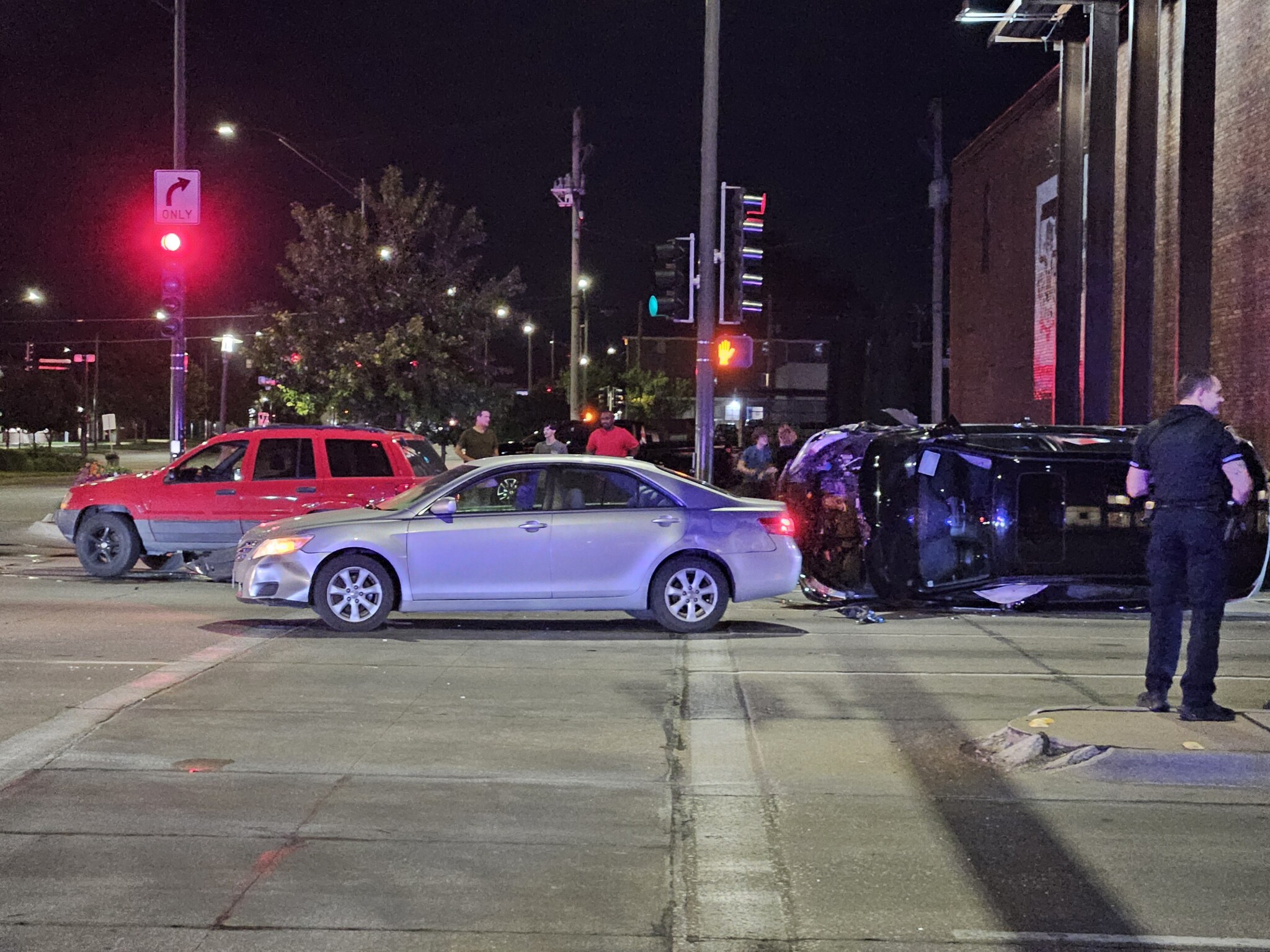 Car ends up on its side in downtown Lincoln crash