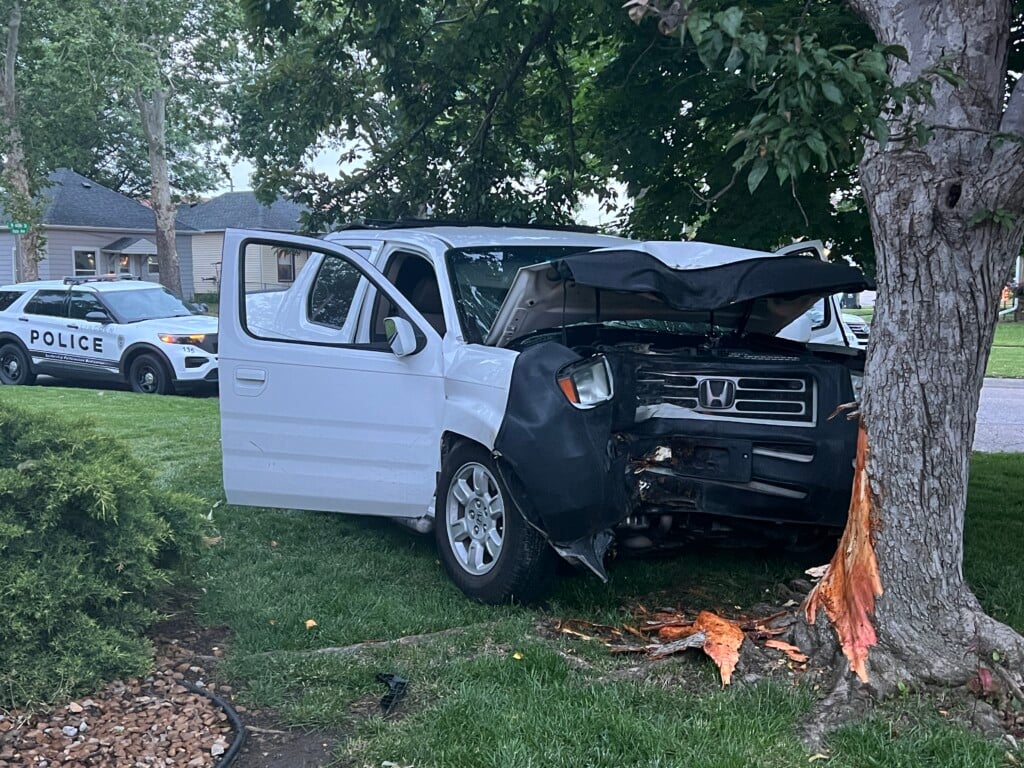 A pickup that crashed into a tree at 60th Street and Platte Avenue