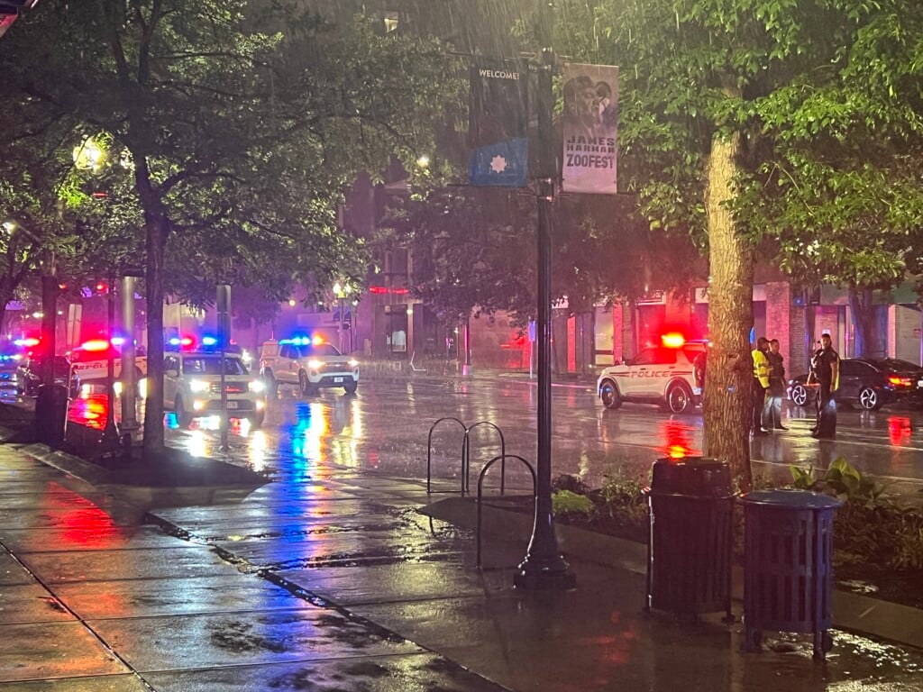 Police investigate a crash on O Street in downtown Lincoln.