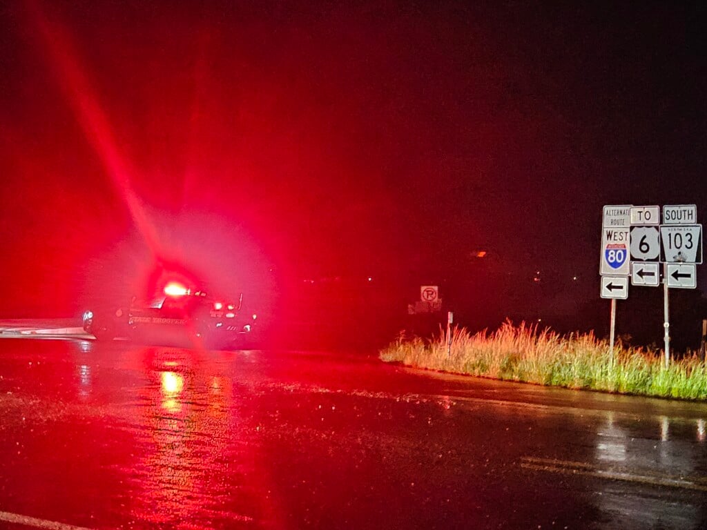 A Nebraska State Patrol cruiser blocks off Interstate 80 at the Pleasant Dale interchange.