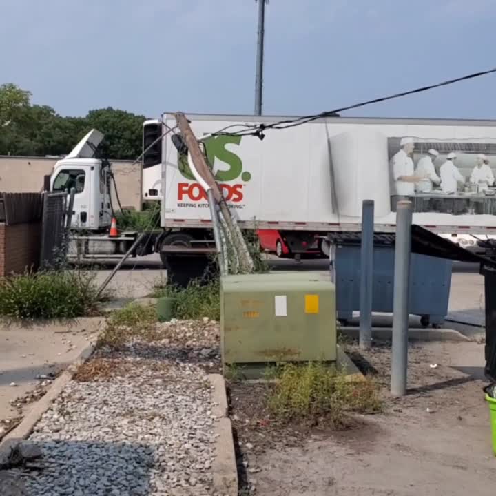 Semi Gets Snagged On Communication Line, Pulling Down Lincoln Power Pole