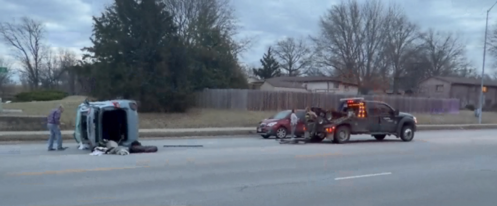 One hospitalized after car flips over in east Lincoln crash