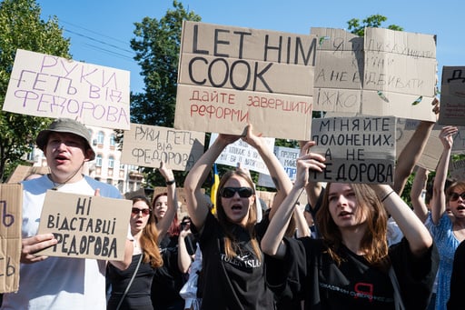 Protesters Rally In Kyiv As Zelenskyy Moves To Oust Ukraine’s Defense Minister