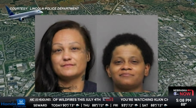 Mugshot of two people arrested for laser strike.