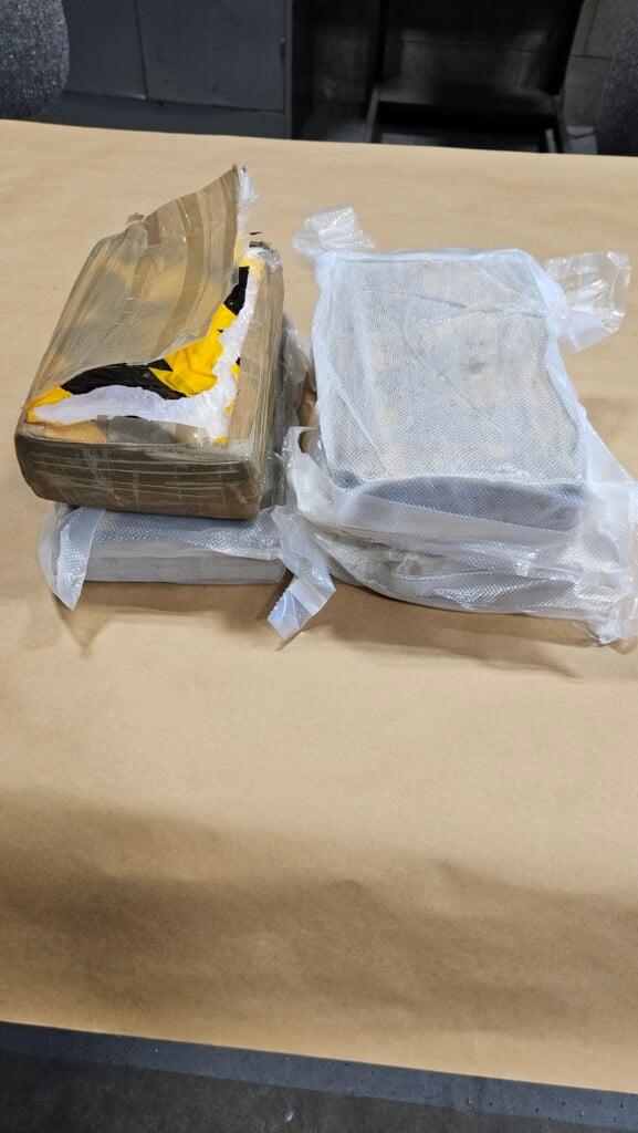 Suspected cocaine in packages on a table.
