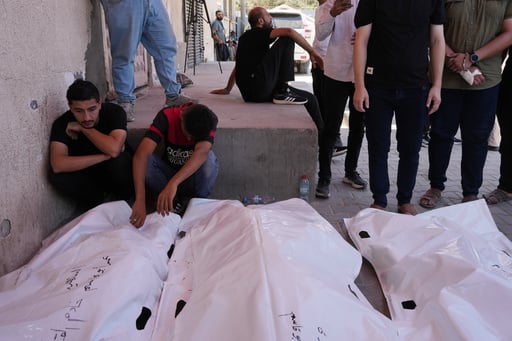 Israel’s Latest Strikes Kill A Dozen People In Gaza, Including Police Officers