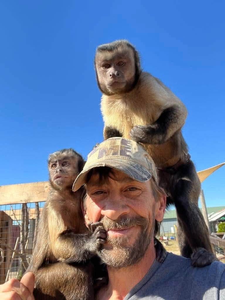 Pete and monkeys at Pete's Safari