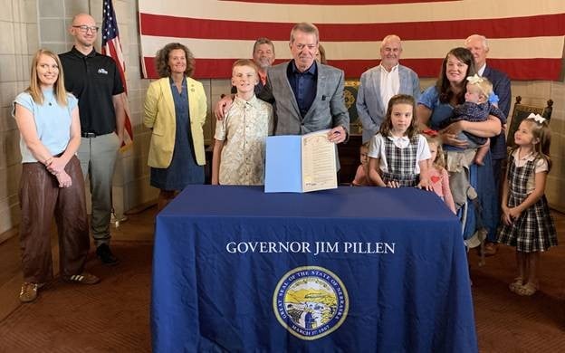 Jim Pillen signing back to school proclamation