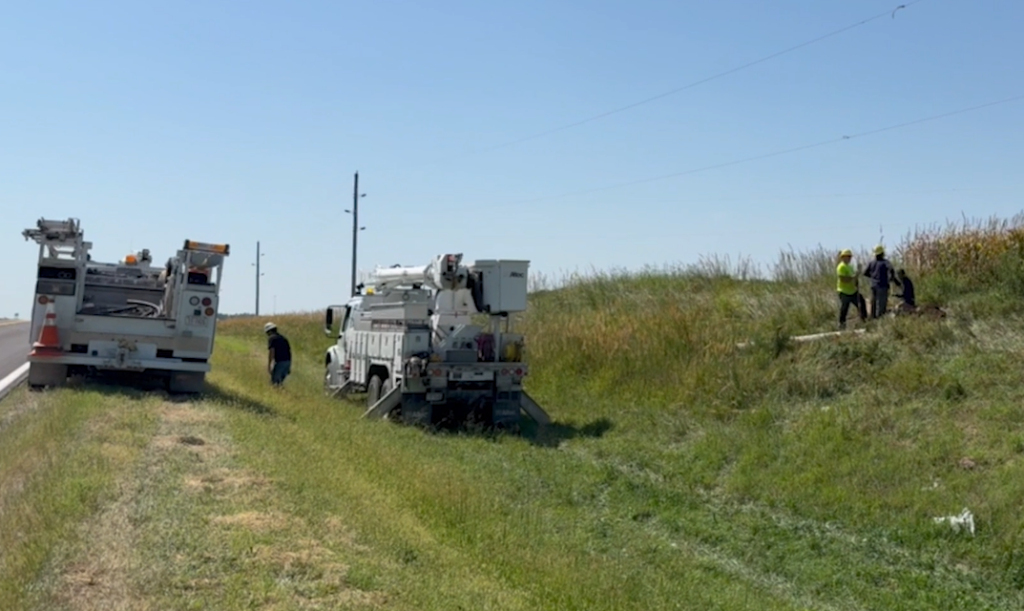 Crews work to replace pole at site of truck crash near Bennet.